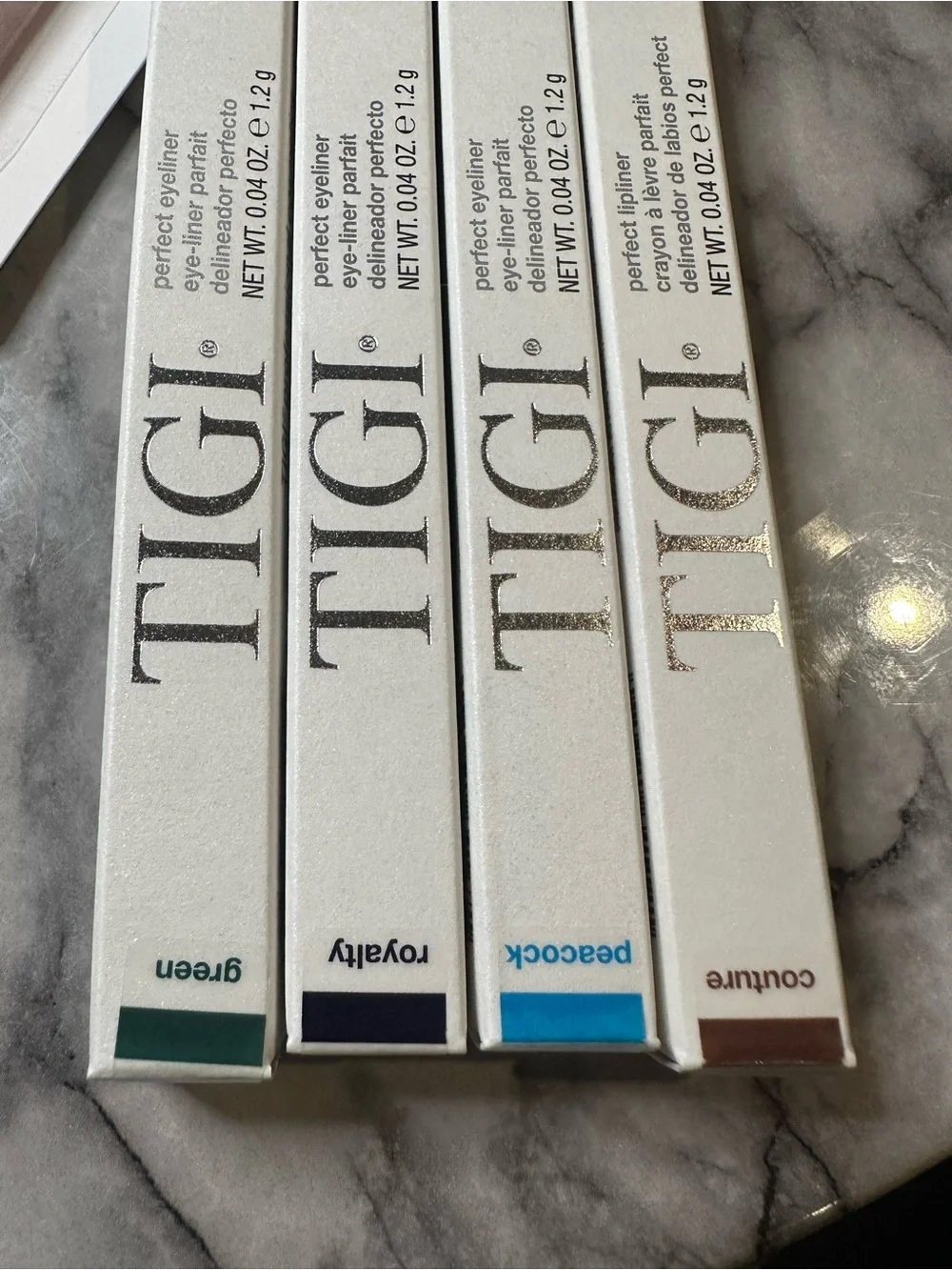 TIGI eyeshadow pallet,3 eyeliners,1 lipliner,glow blush, blush brush,foudation